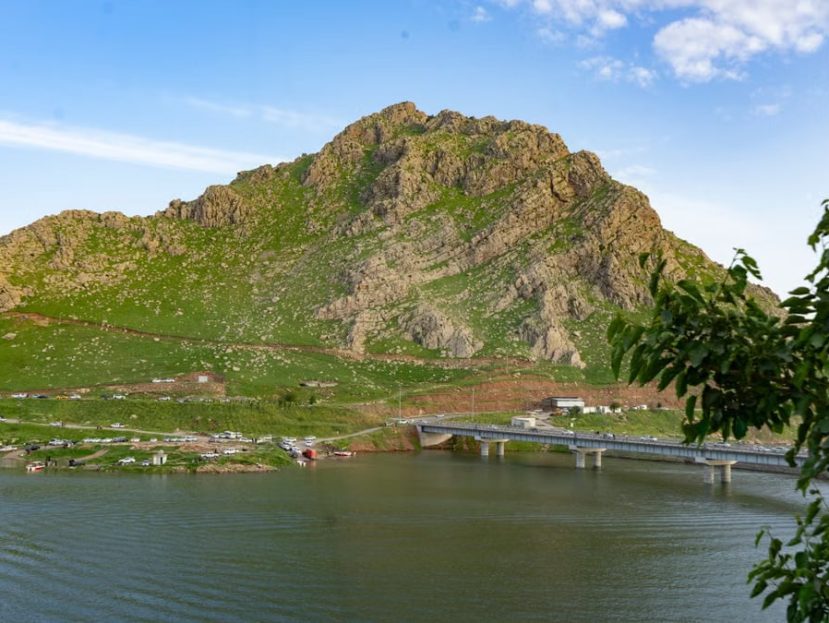 Breathtaking view of a mountain and lake in Kurdistan, perfect for nature enthusiasts and travelers.